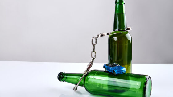 beer bottles and handcuffs