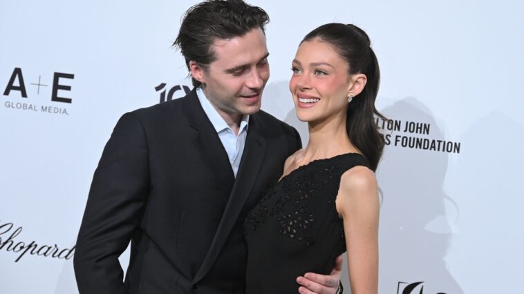 Brooklyn and Nicola Steal a Paris Kiss, but Her Brother Greg Steals the Frame